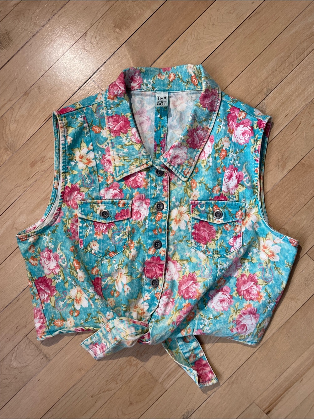 TEA & CUP turquoise and pink floral cropped button down tie front denim top